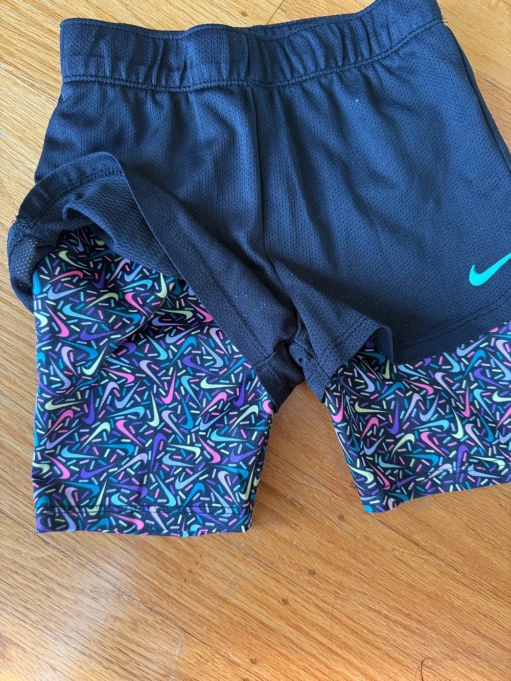 Nike Purple Graphic Tank with Black Shorts and Multicolor Patterned Bike Shorts - Picture 6 of 7